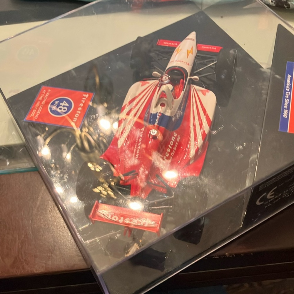 Red and White Formula 1 Model Car